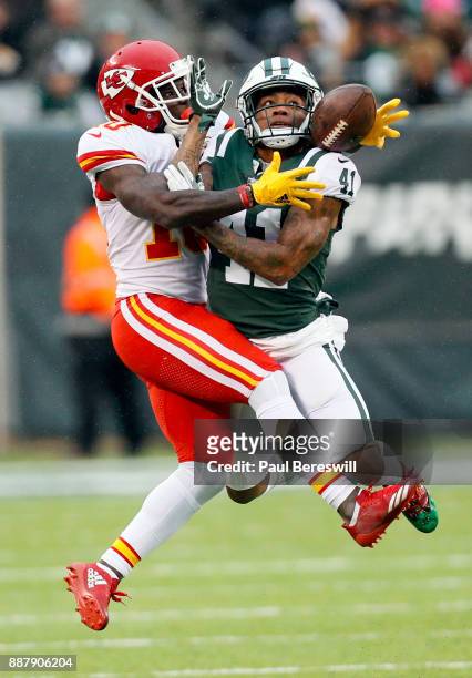 Buster Skrine of the New York Jets tries to keep Tyreek Hill of the Kansas City Chiefs from catching an Alex Smith pass in an NFL football game on...