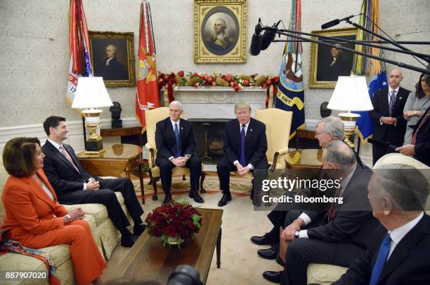 President Donald Trump, center right, speaks as House Minority Leader Nancy Pelosi, a Democrat from California, from left, U.S. House Speaker Paul...