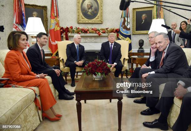 President Donald Trump, center right, speaks as House Minority Leader Nancy Pelosi, a Democrat from California, from left, U.S. House Speaker Paul...