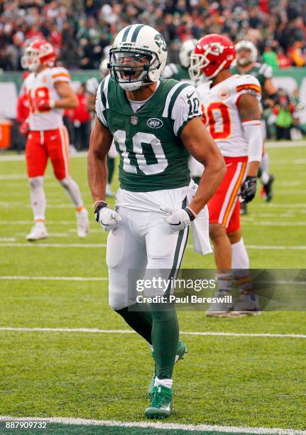 Jermaine Kearse of the New York Jets celebrates after catching a pass and running for a 51 yard gain in the fourth quarter in an NFL football game...