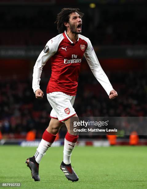 Mohamed Elneny of Arsenal celebrates after scoring his team's sixth goal of the game during the UEFA Europa League group H match between Arsenal FC...