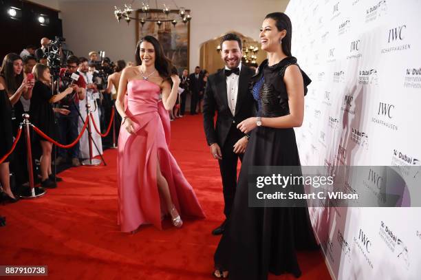 Lawyer Jessica Kahawaty, Tv presenter Wissam Breidy and actress Rym Said attend the sixth IWC Filmmaker Award gala dinner at the 14th Dubai...