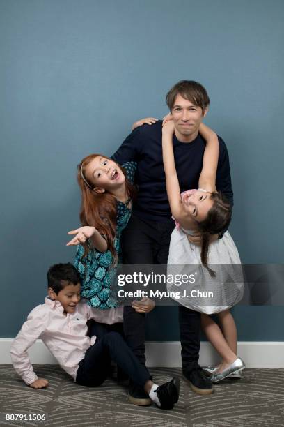 Director Sean Baker of "The Florida Project," and actors Christopher Rivera, left, Valeria Cotto and Brooklynn Prince are photographed for Los...