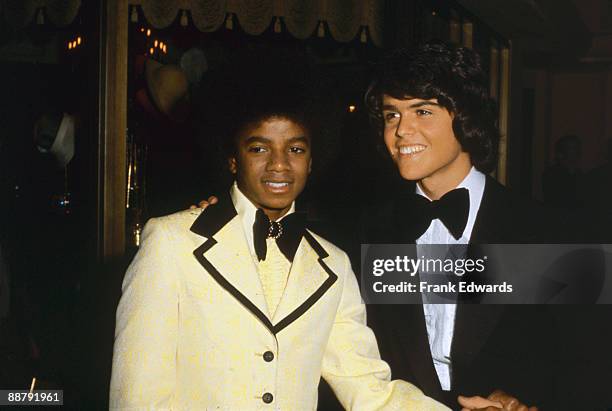 American singer Michael Jackson poses with Donny Osmond at the American Music Awards in Hollywood, 19th February 1974.