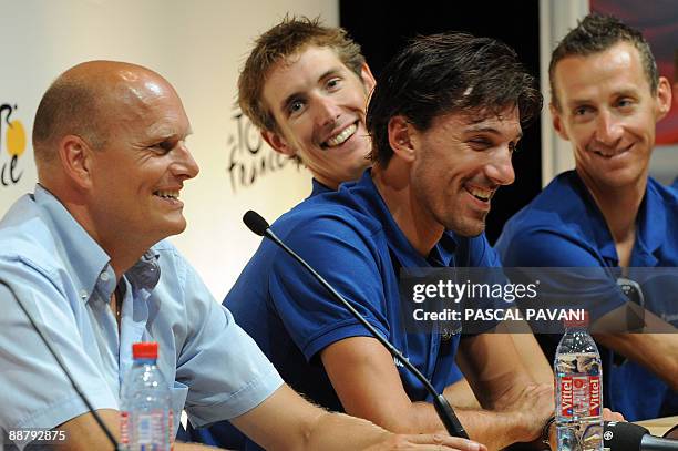 Danish cycling team Team Saxo Bank 's manager Bjarne Riis and riders Andy Schleck of Luxemburg, Fabien Cancellara of Switzerland and Kurt-Asle...