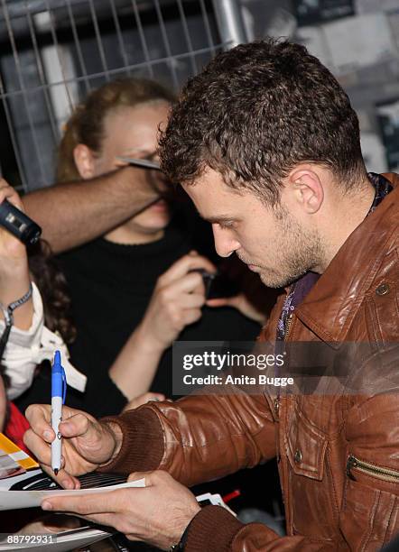 Singer and designer Justin Timberlake arrives to visit the fashion show of his label "William Rast" during the Bread and Butter fashion trade fair at...