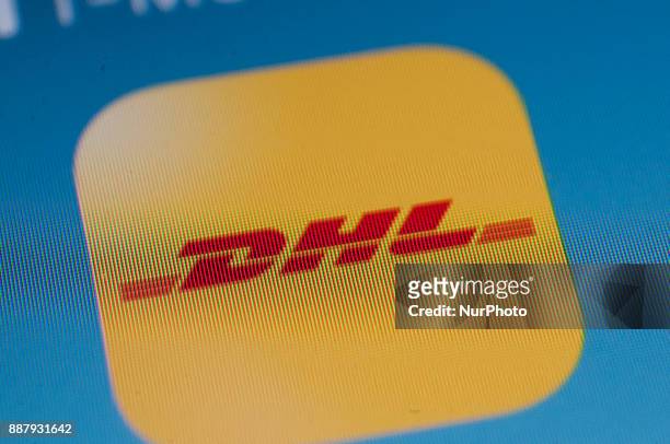 The DHL pracel tracking application is seen on an iPhone on December 7, 2017.