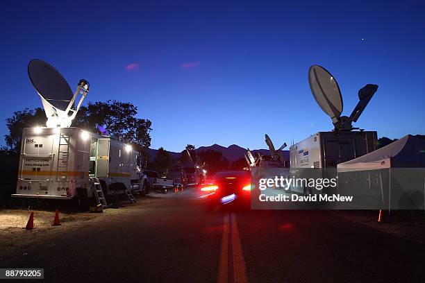 Television news crews begin a morning of coverage outside the gates of Neverland Ranch as fans worldwide continue to mourn the loss of singer Michael...