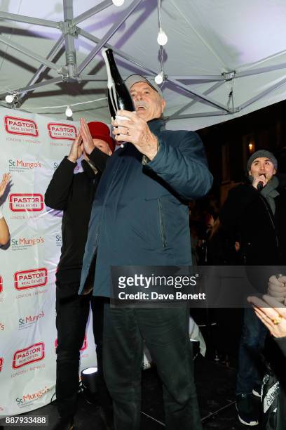 John Cleese switches on the Shepherd Market Christmas lights on December 7, 2017 in London, England.