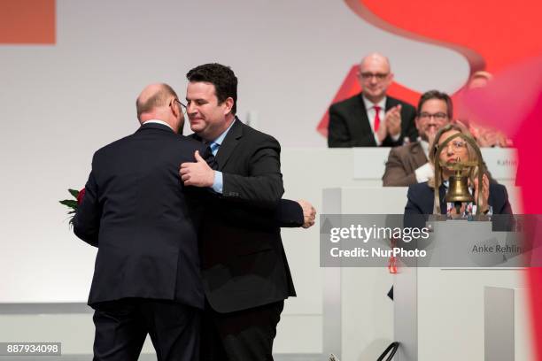 Martin Schulz and Hubertus Heil are pcitured during the party congress of the German Social Democratic Party in Berlin, Germany on December 7, 2017.