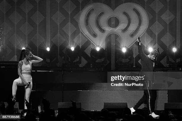 Halsey joins The Chainsmokers as they perform during the Q102's iHeartRadio Jingle Ball 2017 at the Wells Fargo Center in Philadelphia, PA, on...