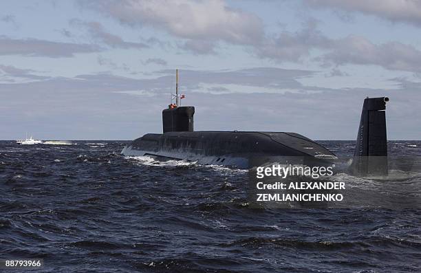 New Russian nuclear submarine, the Yuri Dolgoruky, drives in the water area of the Sevmash factory in the northern city of Arkhangelsk on July 2,...