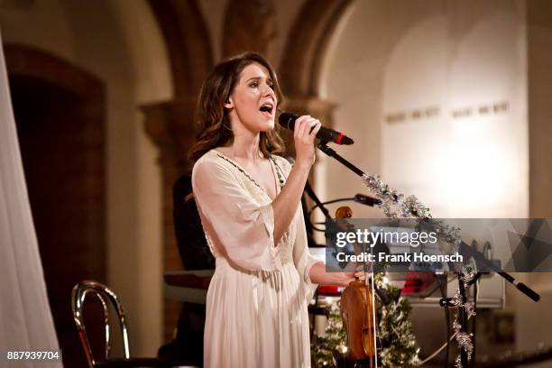 German singer and violinist Franziska Wiese performs live on stage in support of Frank Schoebel during a concert at the Gethsemanekirche on December...