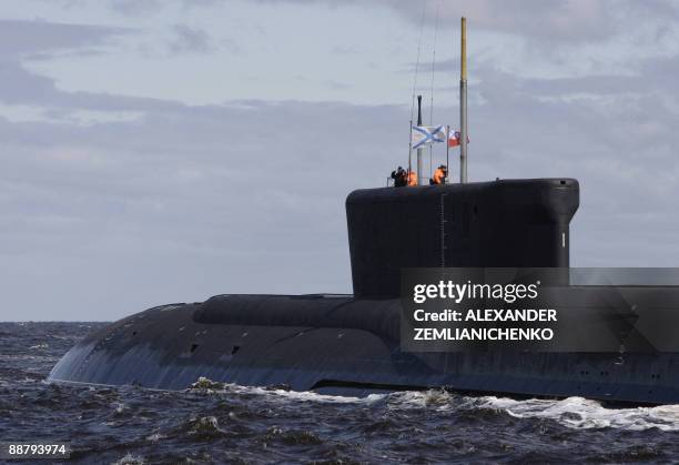 New Russian nuclear submarine, the Yuri Dolgoruky, drives in the water area of the Sevmash factory in the northern city of Arkhangelsk on July 2,...