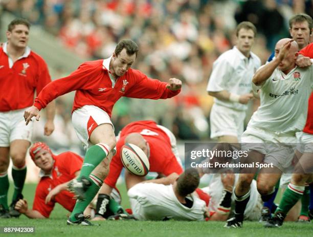 Rob Howley of Wales kicking the ball during their Six Nations rugby union match against England at Twickenham in London on 4th March 2000. England...