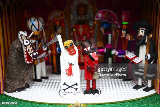 Carol singers figures are presentet during the 75th Nativity Scene Contest at the Main Square on 7 December 2017, in Krakow, Poland. Tradition dates...