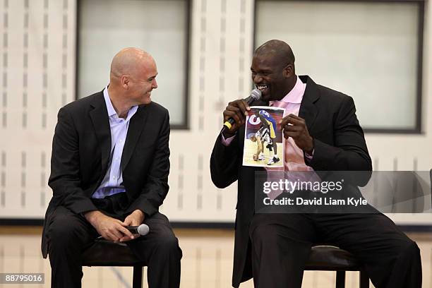 Shaquille O'Neal shows his new General Manager Danny Ferry the results of his Google search of the name Danny Ferry as he is introduced as a new...
