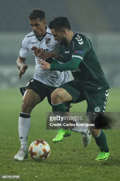 Vitoria Guimaraes defender Victor Garcia from Venezuela vies with Konyaspor midfielder Ali Sahiner from Turkey for the ball possession during the...