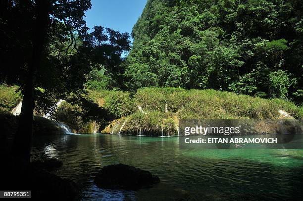 Tourist swims in Semuc Champey National Park, in the Guatemalan department of Alta Verapaz, on June 28, 2009. The Natural monument of Semuc Champey,...