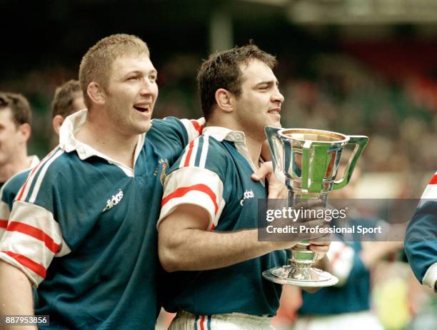 Captain Raphael Ibanez of France with the trophy after winning the Five Nations rugby union Grand Slam championship following their victory over...