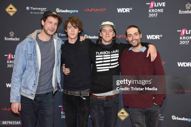 Severin Kantereit, Henning May, Malte Huck and Christopher Annen of the band AnnenMayKantereit attend the 1Live Krone radio award at Jahrhunderthalle...