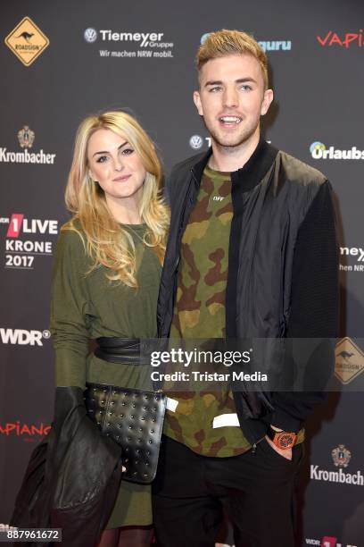 Christoph Kramer and his girlfriend Celina Scheufele attend the 1Live Krone radio award at Jahrhunderthalle on December 7, 2017 in Bochum, Germany.