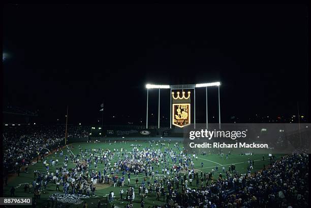 Kansas City Royals' fans run on the field iafter the Royals defeated the St. Louis Cardinals in game seven of the World Series, October 27, 1985 at...