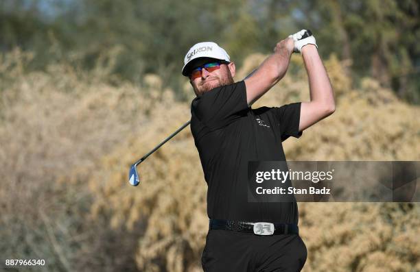 Erik Barnes plays a tee shot on the ninth hole during the first round of the Web.com Tour Qualifying Tournament at Whirlwind Golf Club on the Devil's...