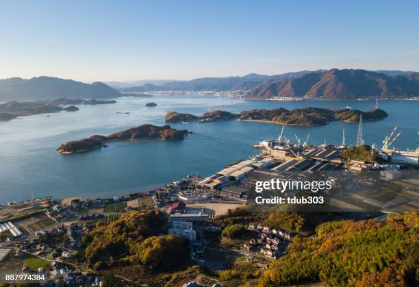 an aerial view of the seto inland sea and island life - seto inland sea stock pictures, royalty-free photos & images