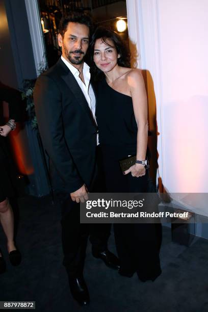 Tomer Sisley and his wife Sandra attend the Annual Charity Dinner hosted by the AEM Association Children of the World for Rwanda at Pavillon Ledoyen...