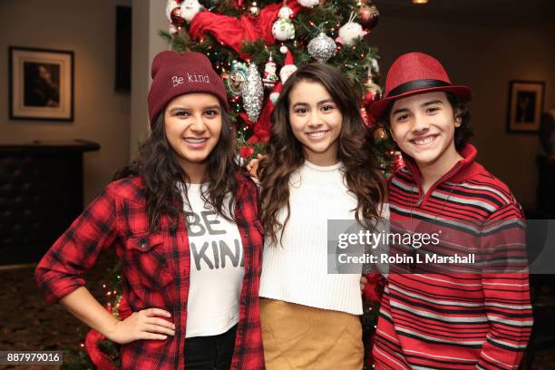 Actors Amber Romero, Ciara A. Wilson and Hunter Payton attend the Holiday Tour of the Hollywood Museum at The Hollywood Museum on December 7, 2017 in...