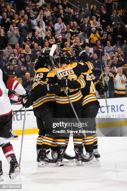 David Backes of the Boston Bruins celebrates his second goal in the second period against the Arizona Coyotes at the TD Garden on December 7, 2017 in...