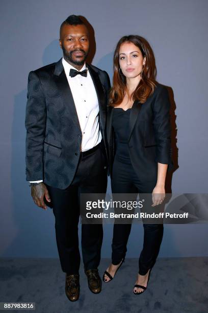 Football player Djibril Cisse and actress Hiba Abouk attend the Annual Charity Dinner hosted by the AEM Association Children of the World for Rwanda...