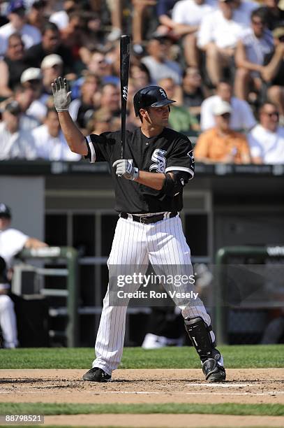 Paul Konerko of the Chicago White Sox asks the umpire for time while at bat against the Chicago Cubs on June 27, 2009 at U.S. Cellular Field in...