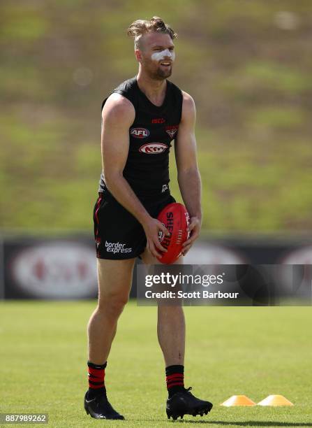 Jake Stringer of the Bombers runs with the ball during an Essendon Bombers Media Announcement & Training Session at Essendon Football Club on...