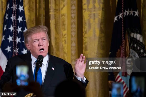 President Donald Trump speaks during a Hanukkah Reception in the East Room of the White House, December 7, 2017 in Washington, DC. Hanukkah begins on...