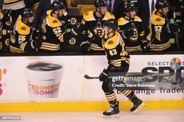 Danton Heinen of the Boston Bruins celebrates his goal against the Arizona Coyotes at the TD Garden on December 7, 2017 in Boston, Massachusetts.