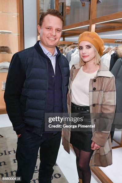 President of Woolrich Nick Brayton and Emma Roberts attend Woolrich
