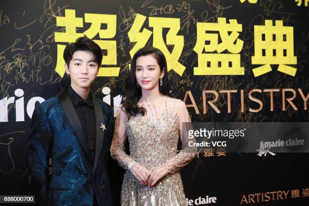 Actress Li Bingbing and actor Wang Junkai arrive on the red carpet of 2017 Marie Claire Style China Artistry Party on December 7, 2017 in Beijing,...