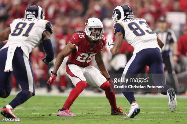 Defensive back Tramon Williams of the Arizona Cardinals lines up against wide receiver Josh Reynolds of the Los Angeles Rams during the NFL game at...