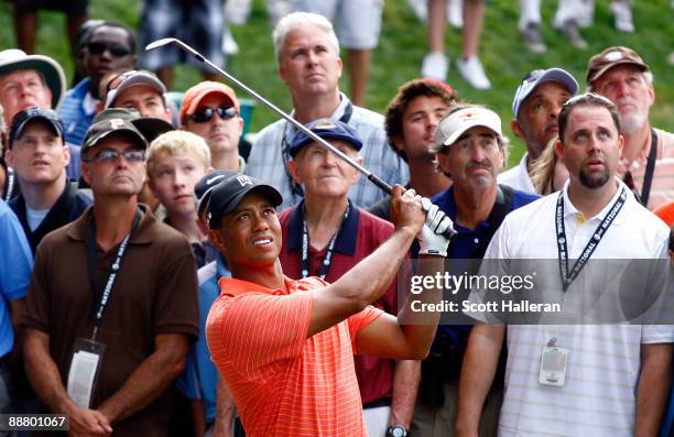 Tiger Woods hits a shot on the 16th hole during the first round of the AT&T National at the Congressional Country Club on July 2, 2009 in Bethesda,...