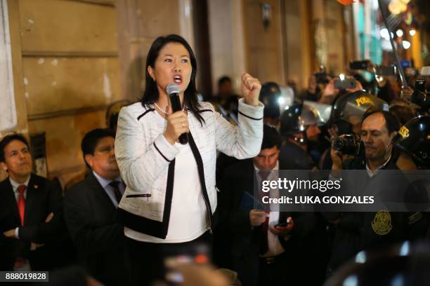 Peru's Fuerza Popular party leader Keiko Fujimori speaks to the press in downtown Lima, on December 7, 2017. Peru's public prosecutor's office...