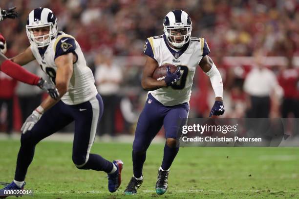 Wide receiver Pharoh Cooper of the Los Angeles Rams runs with the football after a reception against the Arizona Cardinals during the NFL game at the...