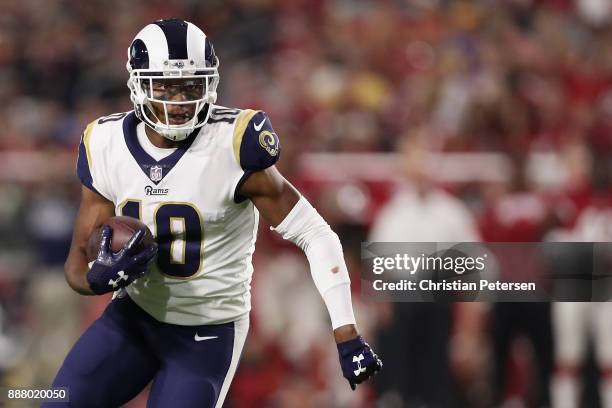 Wide receiver Pharoh Cooper of the Los Angeles Rams runs with the football after a reception against the Arizona Cardinals during the NFL game at the...