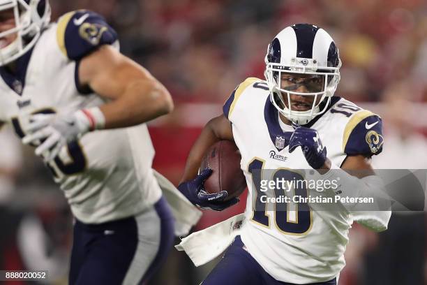 Wide receiver Pharoh Cooper of the Los Angeles Rams runs with the football after a reception against the Arizona Cardinals during the NFL game at the...