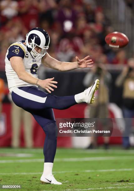 Punter Johnny Hekker of the Los Angeles Rams kicks the football during the NFL game against the Arizona Cardinals at the University of Phoenix...