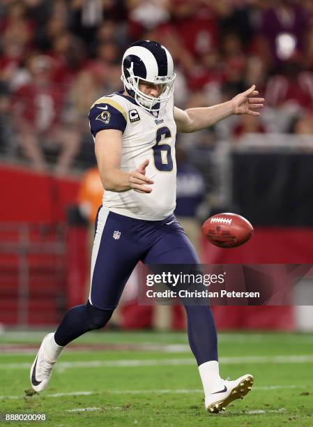 Punter Johnny Hekker of the Los Angeles Rams kicks the football during the NFL game against the Arizona Cardinals at the University of Phoenix...