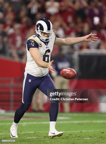 Punter Johnny Hekker of the Los Angeles Rams kicks the football during the NFL game against the Arizona Cardinals at the University of Phoenix...