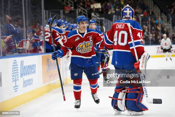 Colton Kehler and goaltender Travis Child of the Edmonton Oil Kings celebrate Kehler's goal against the Moose Jaw Warriors at Rogers Place on...