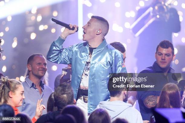 Macklemore, aka Benjamin Hammond Haggerty, performs on stage during the 1Live Krone at Jahrhunderthalle on December 7, 2017 in Bochum, Germany.